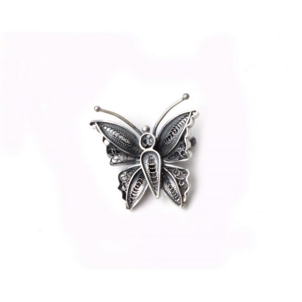 Prendedor Mariposita, Ne